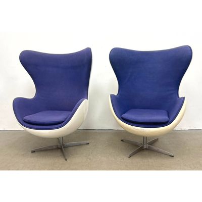 Pair of Mid Century Modern Style Egg Chairs. Swiveling High Back Lounge Chairs with White Fiberglass