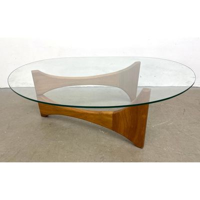 Contemporary wood and Glass Coffee Table After a Pearsall Design.