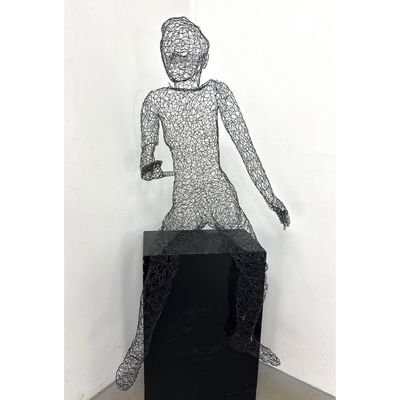 Artisan Life Size Seated Male Figure Crazy Wire Sculpture Pedestal not included.