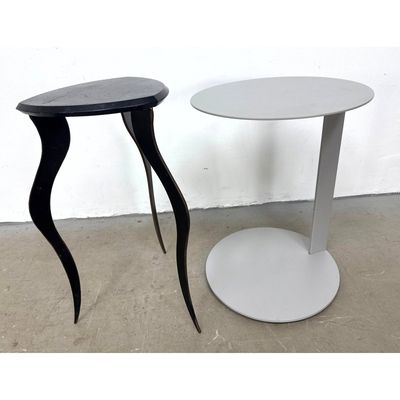 Two modern metal side tables including a C-shaped minimalist gray pedestal and a tripod accent table