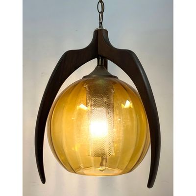 Mid Century Modern Walnut and Amber Glass Swag Pendant Light. Ribbed Amber Glass Ball Shade with Per