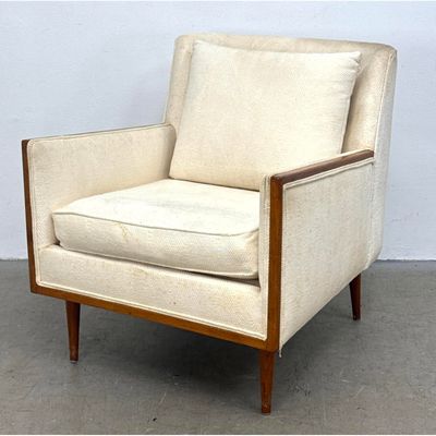 Paul McCobb Style Lounge Chair. Walnut trim and Tapered Legs.