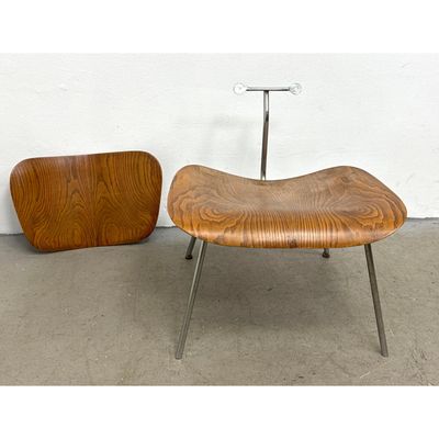 Eames LCM chair. Wood refinished. Back missing rubber stops.