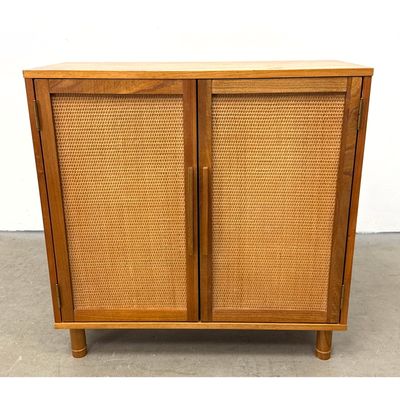 Mid-century modern 2 door Server Cabinet with woven cane panels.