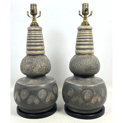 Pair of Mid Century Modern Brutalist Ceramic Table Lamps with Ribbed and Lava Textures.