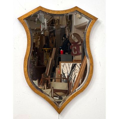 Howard Elliott Collection Shield Shaped Gilt Metal Wall Mirror with Beveled Glass and Distressed Gil