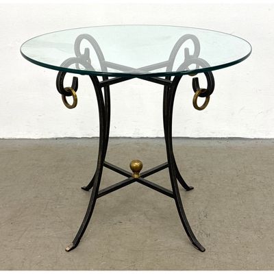 Black Iron, Brass Mounted Side Table. Round Glass Top. Modernist. Brass Ring Accents and Finial.