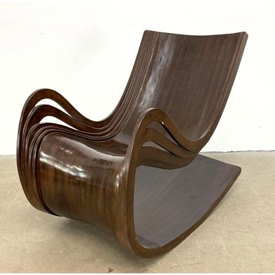 Modernist Sculptural Laminated Bentwood Rocking Chair with Ribbon Armrests and Wenge Finish. Heavy c
