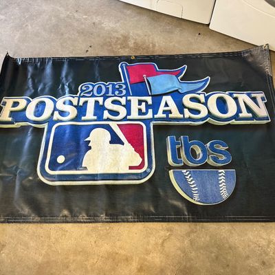 MLB 2013 Postseason vinyl banner featuring the TBS logo and MLB batter silhouette, with metal grommets for hanging.