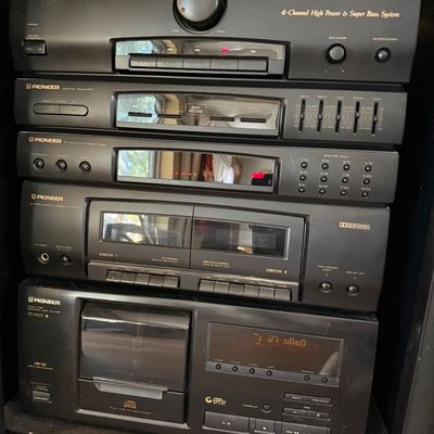 Vintage Pioneer stereo component system, including an RX-590 receiver, graphic equalizer, synthesizer tuner, double cassette deck, and...