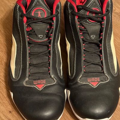Pair of Converse Wade 1 basketball shoes in black, red, and white, showing light wear on the leather uppers.mens size 12