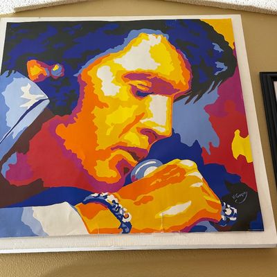 Vibrant pop art poster of Elvis Presley singing into a microphone, signed in the print by artist V. Gorsky.