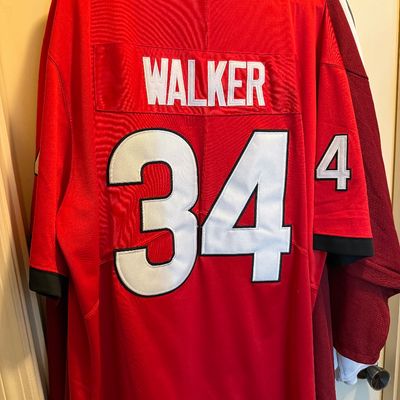 Red Georgia Bulldogs Herschel Walker #34 replica football jersey, featuring stitched name and numbers.