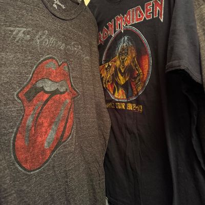 Vintage-style rock band t-shirts featuring a grey heathered Rolling Stones tongue logo tee and a black Iron Maiden World Tour 1982-83...