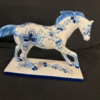 Blue and white painted pony