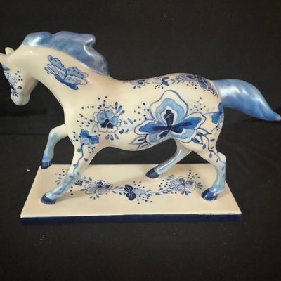 Blue and white painted pony