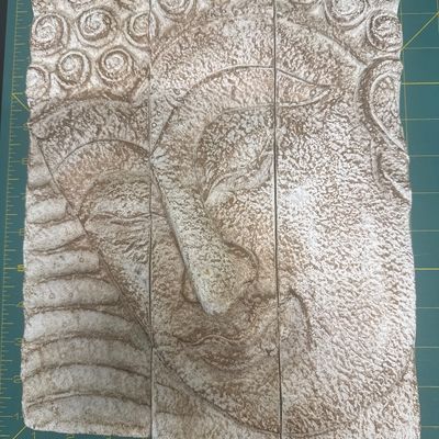 Triptych wall carving