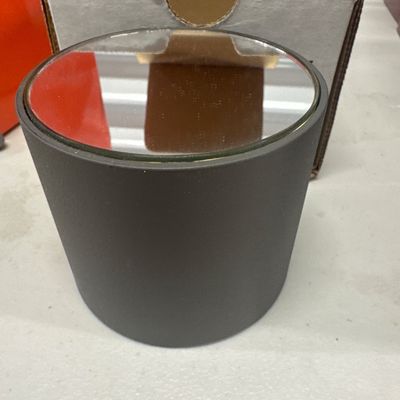 Rotating mirrored revolving display for small figurine