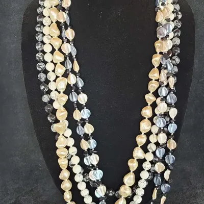 Collection of Blue and Cream Tone Necklaces 