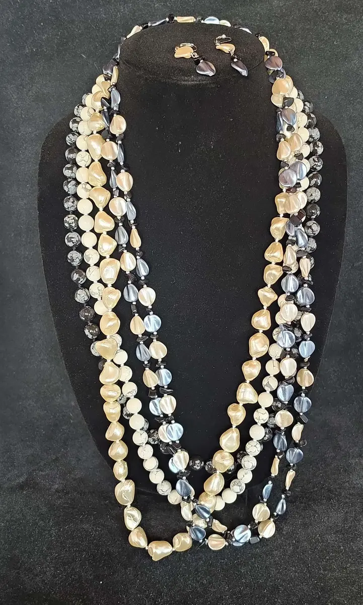 Collection of Blue and Cream Tone Necklaces 