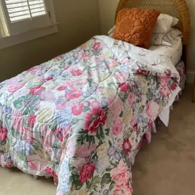 Twin Bed With Wicker Headboard, Serta Mattress & Floral Bedding (1 of 2)