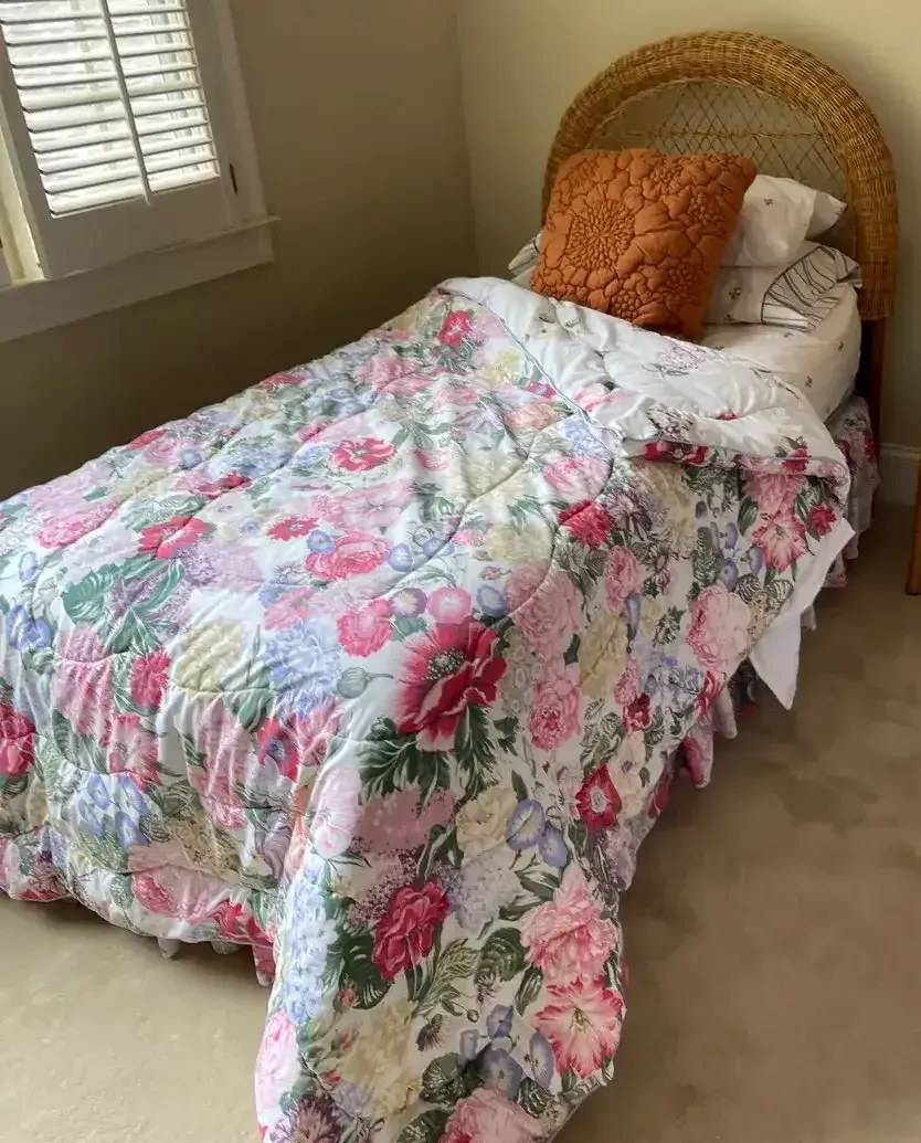 Twin Bed With Wicker Headboard, Serta Mattress & Floral Bedding (1 of 2)