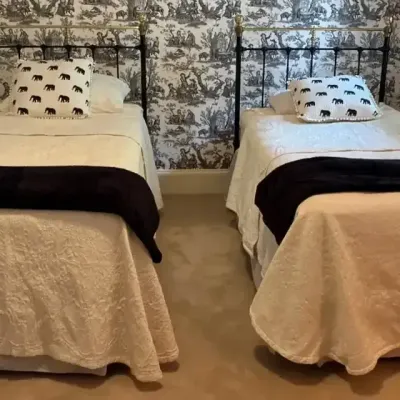 Pair of Brass Twin Beds With Bedding