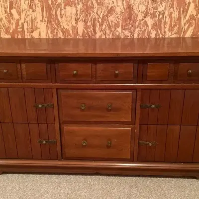 Nine-Drawer Wood Dresser With Metal Accents