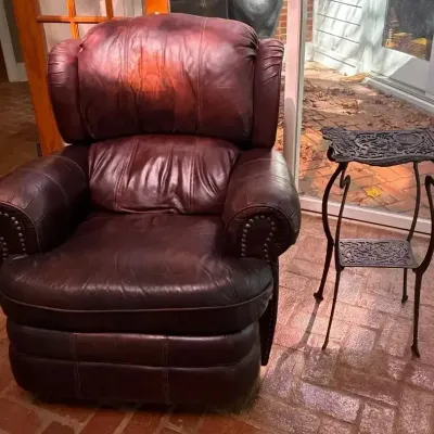 Brown Recliner & Wrought Iron Side Table
