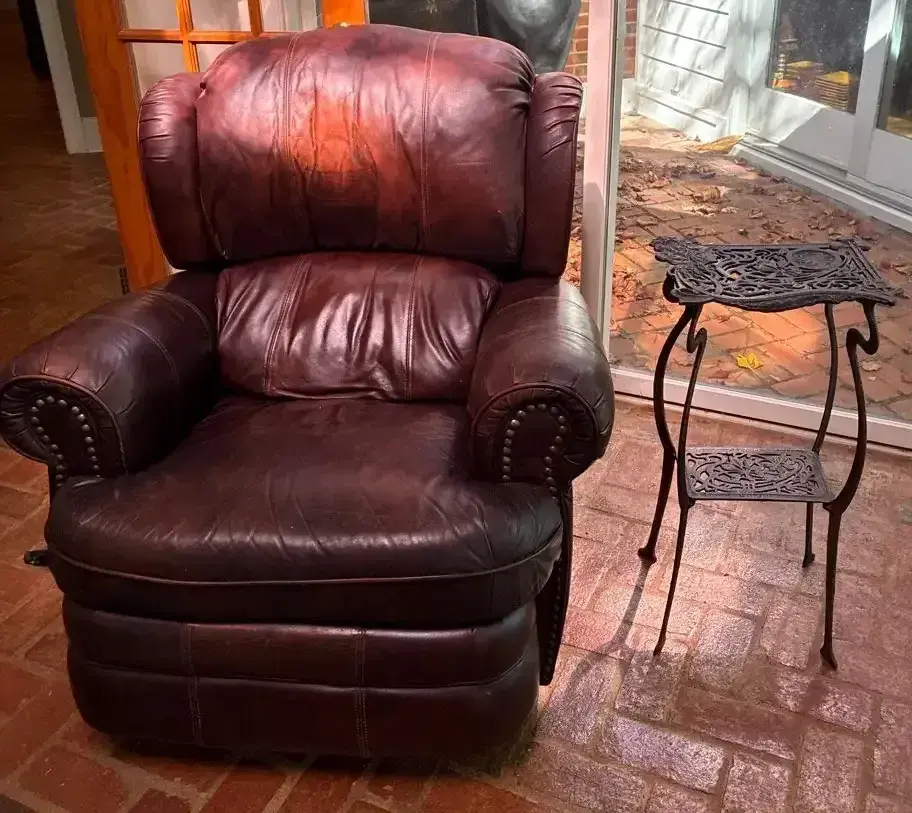 Brown Recliner & Wrought Iron Side Table