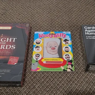 Three Toy Games New in Package including Cards Against Humanity