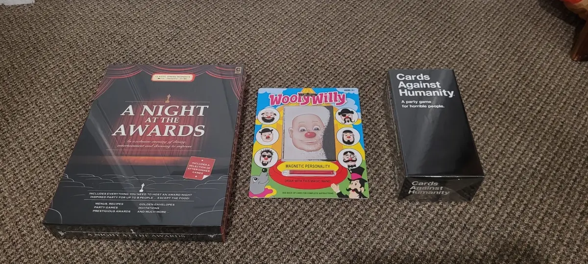 Three Toy Games New in Package including Cards Against Humanity