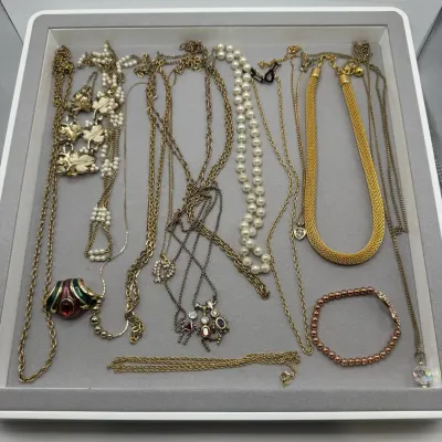 Costume Jewelry Including Gold Tone Necklaces, Bracelets, Faux Pearls