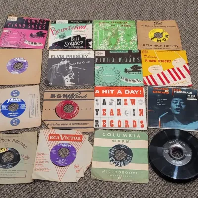 Vintage Vinyl 45 7" Records including Elvis Presley and Ella Fitzgerald