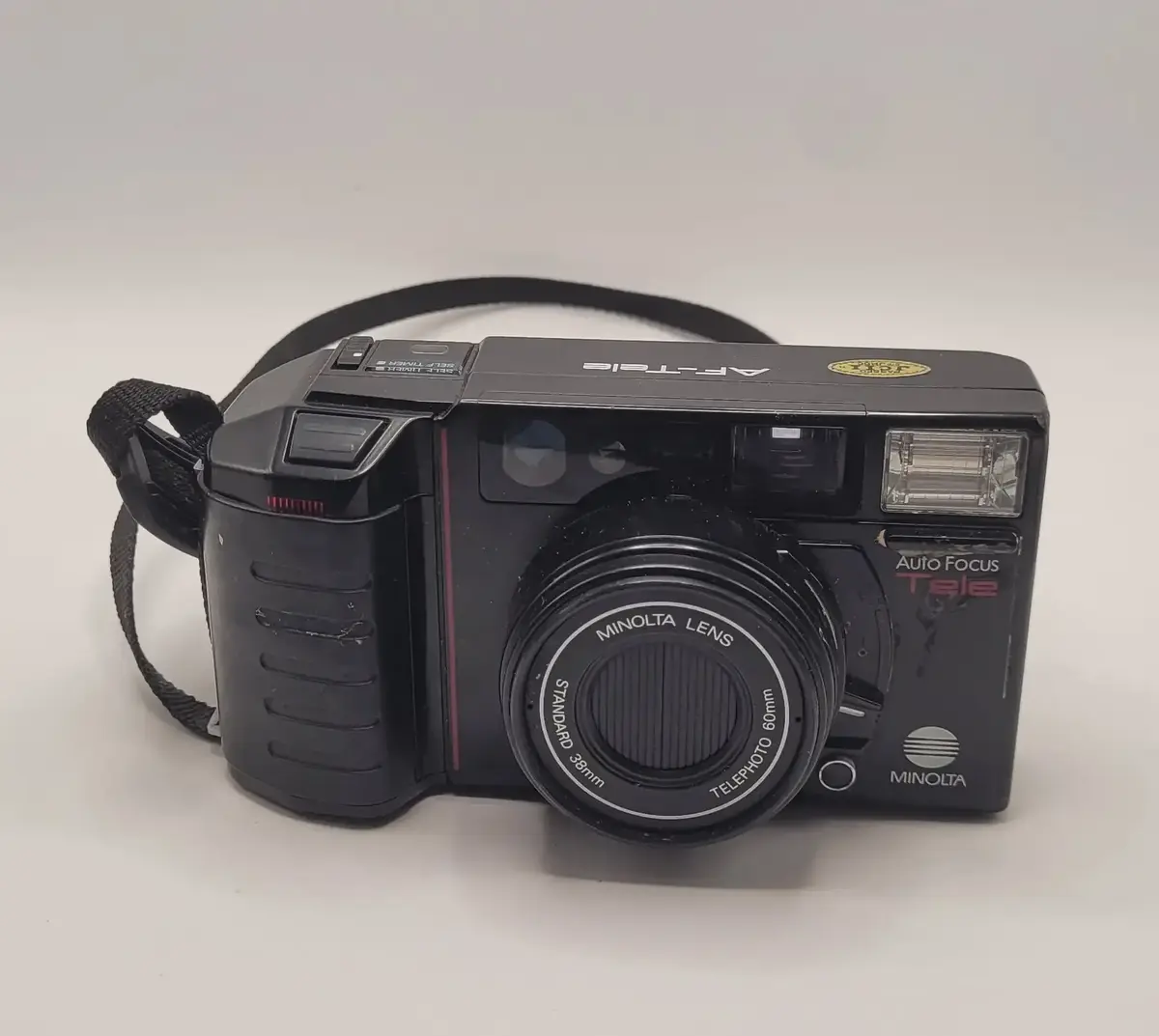 Vintage Minolta AF-Tele 35mm Camera with Leather Bell & Howell Bag
