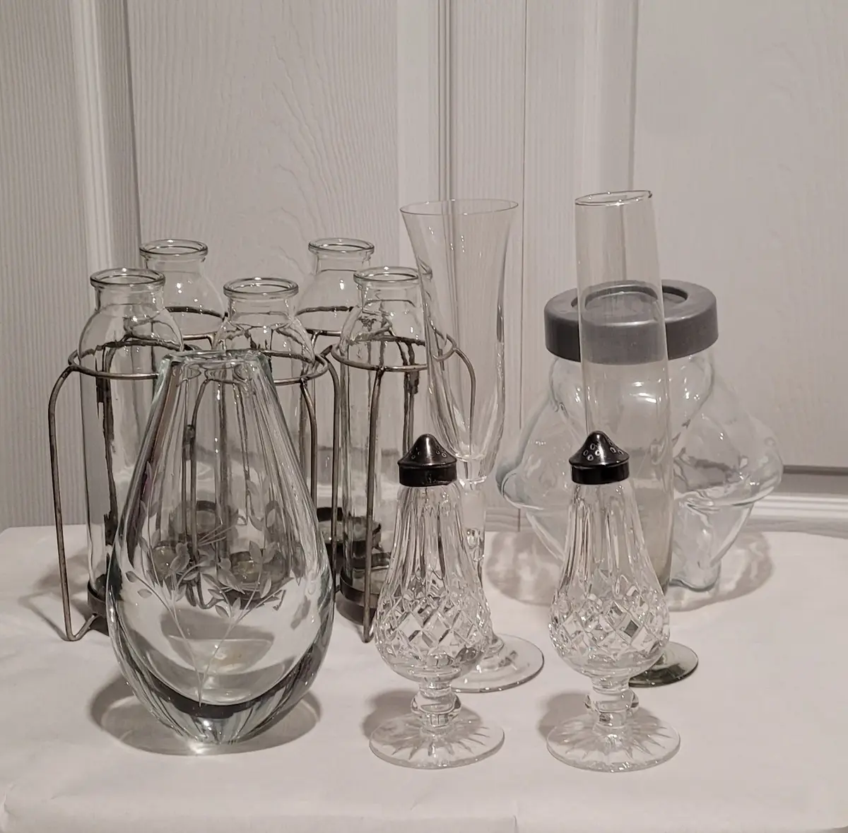 Lot of Miscellaneous Glassware including Salt and Pepper Shakers, Stemware, Etched Vase, Milk Bottle