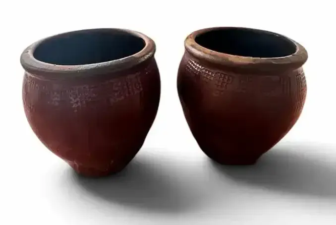Pair of Large Red Glazed Ceramic Planters