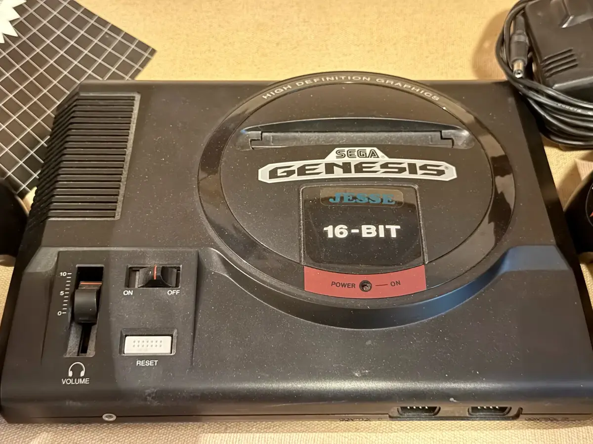 Sega Genesis, Vintage Video Game Console And Two Controllers