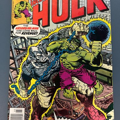 Sale Photo Thumbnail #13: Vintage Marvel Comics Group 'The Incredible Hulk' issue #209 from March 1976. Features the Hulk battling the Absorbing Man (Crusher Creel). 30-cent cover price. The comic shows some light edge wear, minor spine stress lines, and slight yellowing of the pa