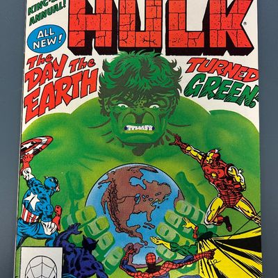 Sale Photo Thumbnail #23: Vintage Marvel Comics Group 'The Incredible Hulk' King-Size Annual #11 from 1982. Titled 'The Day The Earth Turned Green!', featuring Captain America, Iron Man, Spider-Man, Vision, and Black Panther on the cover. The back cover features a vintage advertis