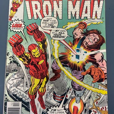 Sale Photo Thumbnail #71: Marvel Comics Group 'The Invincible Iron Man' Issue No. 93, dated December 1976. Features Iron Man battling the Kraken. Cover price 30c. The comic is in raw, ungradable condition with some visible edge wear, spine stress lines, and light yellowing on the 