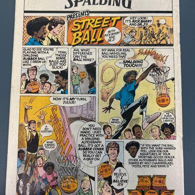 Sale Photo Thumbnail #82: Marvel's Greatest Comics #71 from July 1977, starring the Fantastic Four in "The Madness of the Mole Man!". Features classic cover art and a vintage Spalding Street Ball back cover advertisement featuring Rick Barry and Dr. J. The comic shows some light w