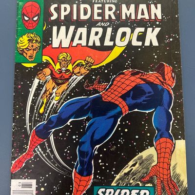 Sale Photo Thumbnail #67: Marvel Team-Up Vol. 1, No. 55, published in March 1977. Features Spider-Man and Adam Warlock in 'Spider, Spider, On The Moon!'. Cover art by Dave Cockrum. The comic shows some signs of wear consistent with age, including minor spine creasing, edge wear, a