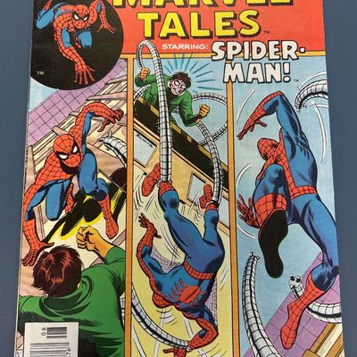Sale Photo Thumbnail #33: Marvel Tales Starring Spider-Man #70 (August 1976). Features Spider-Man battling Doctor Octopus with cover art by John Romita Sr. The comic shows some light wear along the spine, minor corner creasing, and typical page yellowing consistent with age, but r