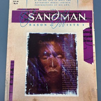 Sale Photo Thumbnail #25: The Sandman No. 22, published in January 1991 by DC Comics. This issue features 'Season of Mists: Chapter 1' written by Neil Gaiman with art by Kelley Jones and Malcolm Jones III. The back cover features a full-page advertisement for the film 'The Rookie'