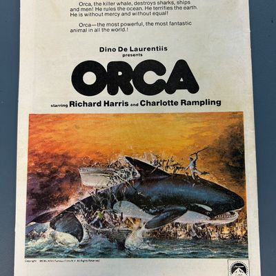 Sale Photo Thumbnail #15: Vintage Marvel Comics Group 'The Incredible Hulk' issue No. 215 from September 1977. Features Hulk battling the forces of S.H.I.E.L.D. and a back cover advertisement for the movie 'Orca'. The comic shows some light wear along the spine and edges consisten
