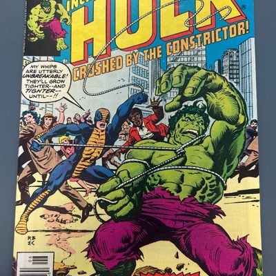 Sale Photo Thumbnail #65: Vintage Bronze Age Marvel comic book, The Incredible Hulk #212 from June 1977. Features the Hulk battling the Constrictor. Cover price 30 cents. The comic shows some light wear along the spine and edges consistent with age, but remains in overall good col