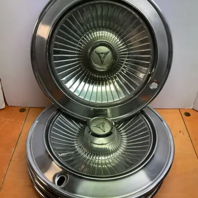 Four 1960’s 14” Dodge Hubcaps