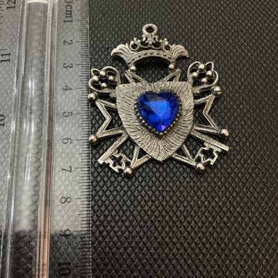 Silver-Tone Crest & Keys Pendant with Blue Rhinestone Heart
