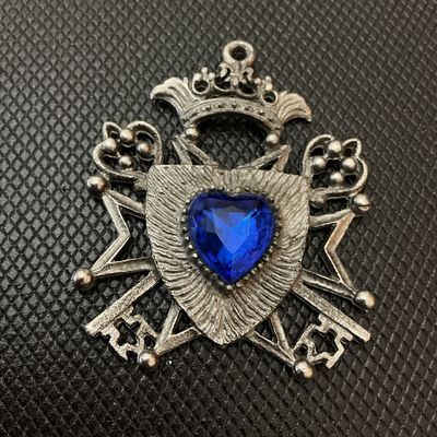 Silver-Tone Crest & Keys Pendant with Blue Rhinestone Heart